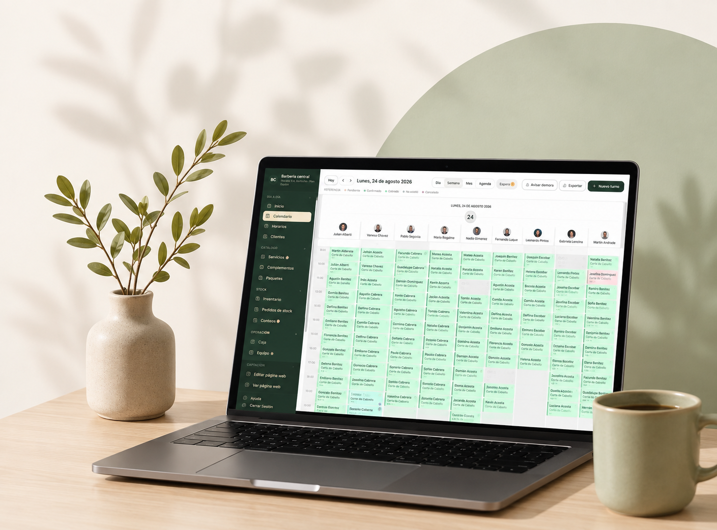 Tiska abierto en una notebook sobre un escritorio, con la agenda del dia de una barberia